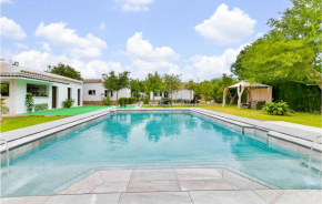 Amazing home in El Coronil with Outdoor swimming pool, WiFi and 2 Bedrooms